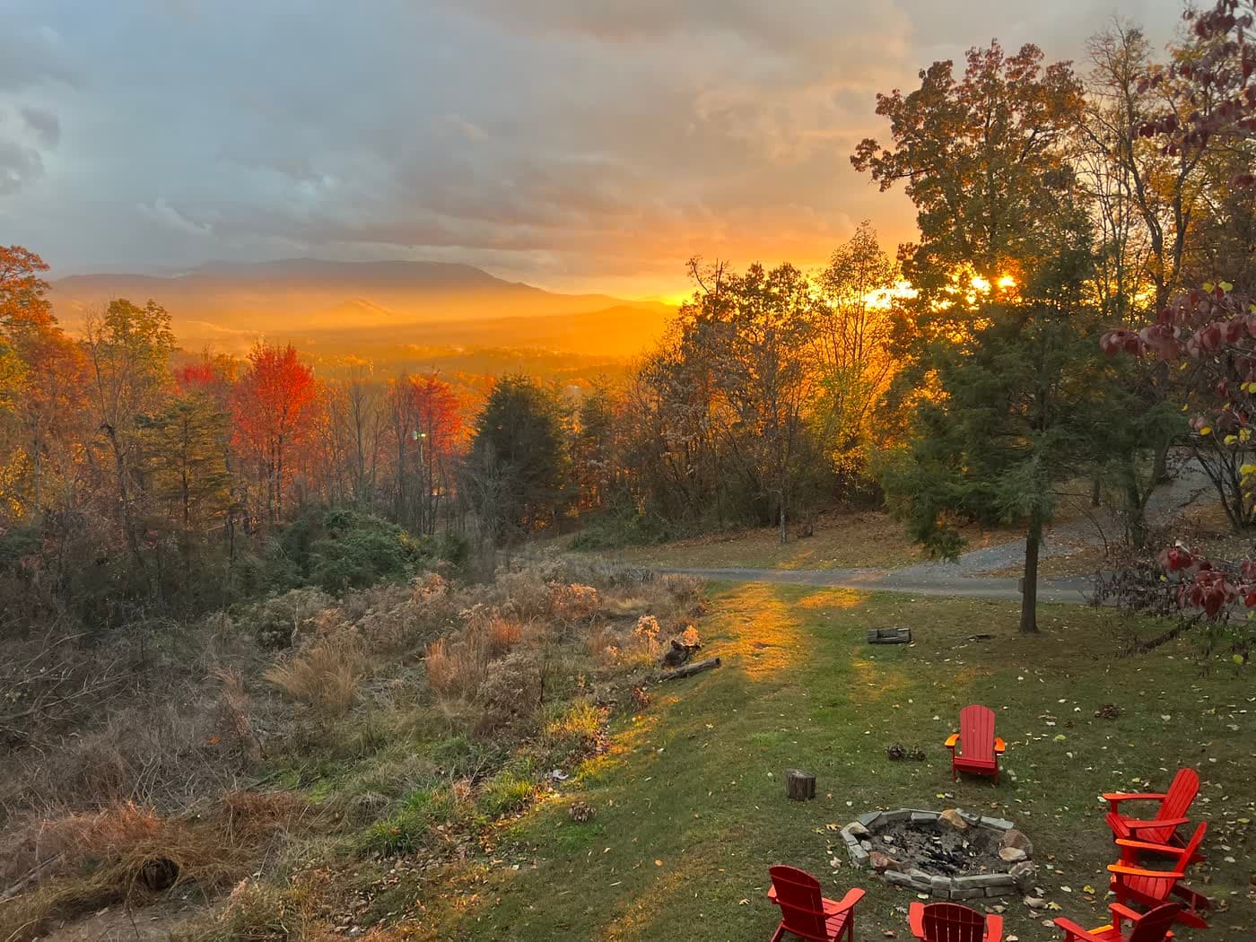 Sunset over the ridgeline above Dollywood from the cabin deck